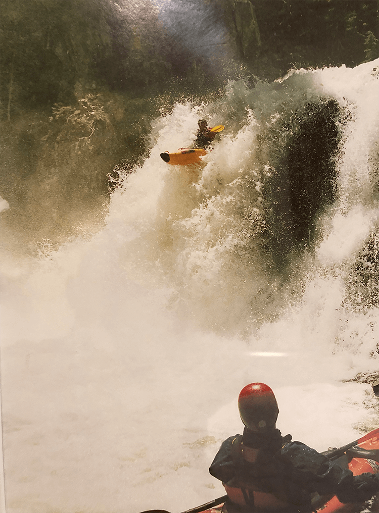 finnie mcmahon in kayak going over water fall when he was younger before martial arts academy opened